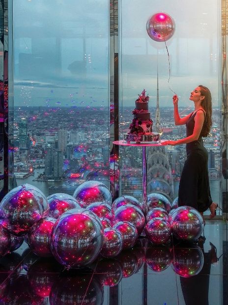 A luxurious event space featuring a stunning city view, ideal for private and corporate gatherings.